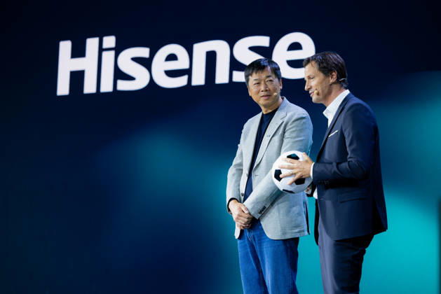 Hisense Press Conference at IFA Germany, Berlin, on September 3, 2026. Hanson Han, CEO of Hisense Europe, and Guillaume Sabran, Chief of Sponsorship and Licensing at UEFA, holding a soccer ball. Hisense is an official sponsor of the 2028 UEFA Euro soccer tournament in the UK and Ireland.