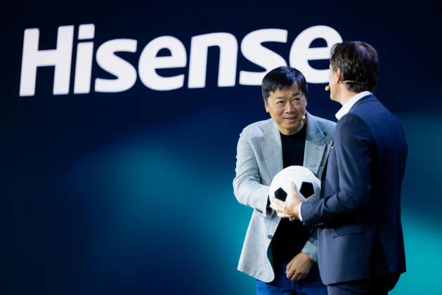 Hisense Press Conference at IFA Germany, Berlin, on September 3, 2026. Hanson Han, CEO of Hisense Europe, and Guillaume Sabran, Chief of Sponsorship and Licensing at UEFA, holding a soccer ball. Hisense is an official sponsor of the 2028 UEFA Euro soccer tournament in the UK and Ireland.