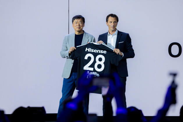 Hisense Press Conference at IFA in Germany, Berlin, September 3, 2026. Hisense Europe CEO Hanson Han and UEFA Chief of Sponsorship and Licensing Guillaume Sabran jointly hold up a jersey with the number 28. Hisense is an official sponsor of the UEFA Euro 2028 soccer tournament in the UK and Ireland.