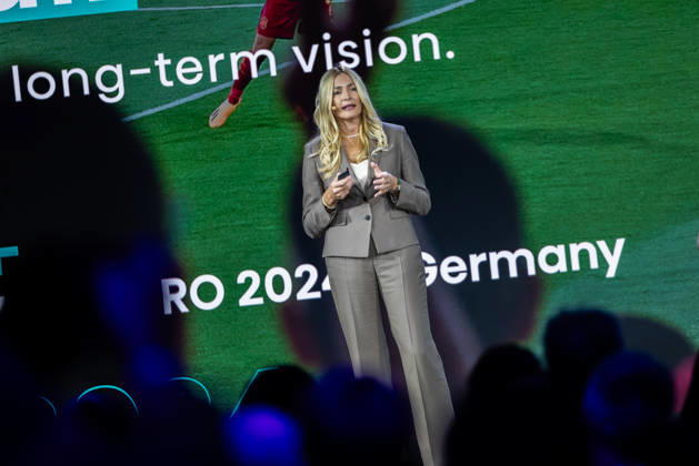 Hisense Press Conference at IFA Germany, Berlin, September 3, 2026. Alenka Potpcnik Anazic, Marketing Director at Hisense Europe—whose name is pronounced ÖPotoschnik Anschesch™ —stands on stage in front of the audience during Hisense’s presentation on global consumer electronics and home appliances.