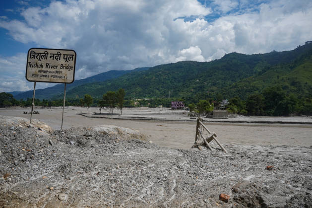 September 4, 2026, Nuwakot, Bagmati, Nepal: Flood originating from the Nepal-Tibet border area have washed away the 142.42-meter-long bridge over the Trishuli River. Due to the loss of the bridge, the movement of locals and vehicles has been halted. Nuwakot Nepal  - ZUMAa308 20260904_znp_a308_001 Copyright: xChandraxBahadurxAlex