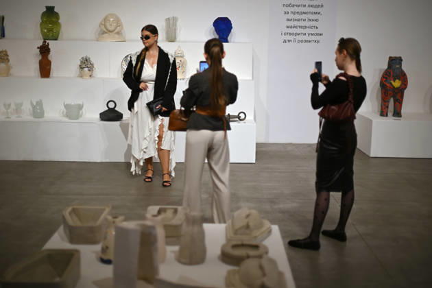 A woman poses at the spatial exhibition Behind the Craft, dedicated to Ukrainian crafts and their reinterpretation by contemporary designers, during Ukrainian Fashion Week SS27 at the Mystetskyi Arsenal National Cultural, Art and Museum Complex, Kyiv, Ukraine, September 5, 2026.(Photo by Yevhen Kotenko Ukrinform) Guests visit Ukrainian Fashion Week SS27 in Kyiv  Copyright: xYevhenxKotenkox
