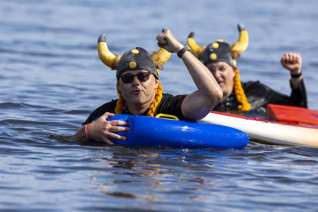 24 Elbe Swim Strehla 24 Elbe Swim Strehla 55 participants, some wearing quirky costumes, swim in the waters of the Elbe River in Strehla, Saxony, Germany Daniel Wagner