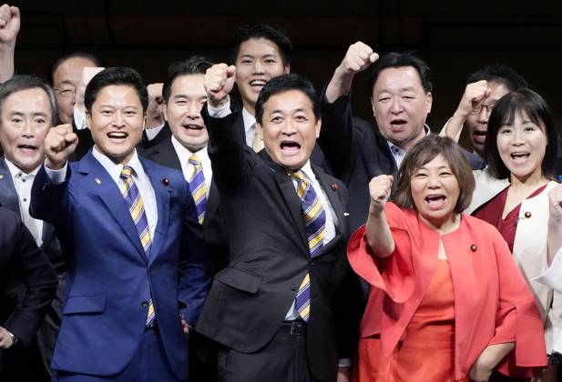 Japan s opposition party incumbent head Tamaki re-elected Yuichiro Tamaki (front, C) pumps his fist in Tokyo after securing a third term as leader of Japan s opposition Democratic Party for the People in its leadership election on Sept. 6, 2026.  A14AA0005627156P
