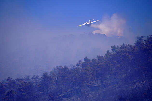 Wildfire in Mugla MUGLA, TURKIYE - SEPTEMBER 7: Firefighting aircraft continue cooling operations after a forest fire that broke out in the Mentese district and spread to the Ula district was largely brought under control following aerial and ground intervention in Mugla, Turkiye, on September 7, 2026. Osman Akca Anadolu Mugla Turkey. Editorial use only. Please get in touch for any other usage.  Copyright: x2026xAnadoluxOsmanxAkcax