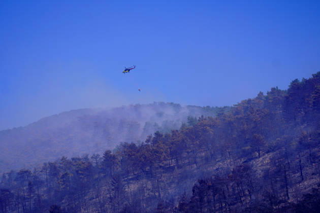 Wildfire in Mugla MUGLA, TURKIYE - SEPTEMBER 7: Firefighting aircraft continue cooling operations after a forest fire that broke out in the Mentese district and spread to the Ula district was largely brought under control following aerial and ground intervention in Mugla, Turkiye, on September 7, 2026. Osman Akca Anadolu Mugla Turkey. Editorial use only. Please get in touch for any other usage.  Copyright: x2026xAnadoluxOsmanxAkcax