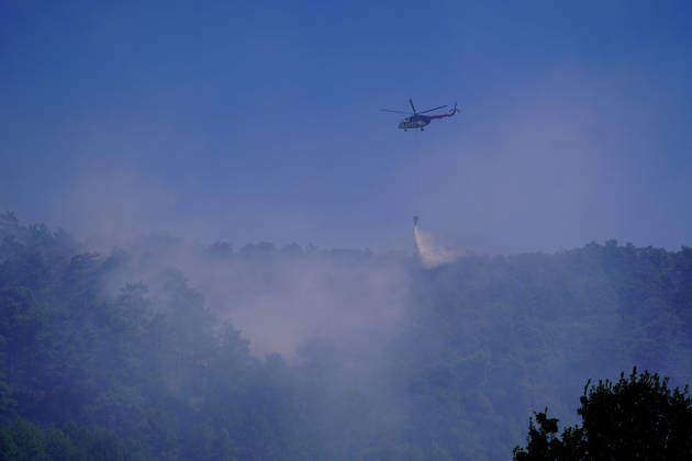 Wildfire in Mugla MUGLA, TURKIYE - SEPTEMBER 7: Firefighting aircraft continue cooling operations after a forest fire that broke out in the Mentese district and spread to the Ula district was largely brought under control following aerial and ground intervention in Mugla, Turkiye, on September 7, 2026. Osman Akca Anadolu Mugla Turkey. Editorial use only. Please get in touch for any other usage.  Copyright: x2026xAnadoluxOsmanxAkcax