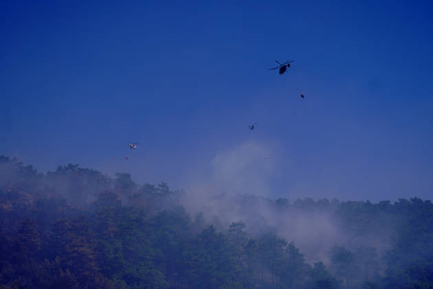 Wildfire in Mugla MUGLA, TURKIYE - SEPTEMBER 7: Firefighting aircraft continue cooling operations after a forest fire that broke out in the Mentese district and spread to the Ula district was largely brought under control following aerial and ground intervention in Mugla, Turkiye, on September 7, 2026. Osman Akca Anadolu Mugla Turkey. Editorial use only. Please get in touch for any other usage.  Copyright: x2026xAnadoluxOsmanxAkcax