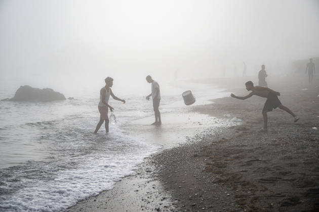 Settlements Continue on El Trampolín Beach Migrants relax on El Trampolín Beach, September 7, 2026, in Ceuta, Spain. Despite having been cleared, the camp on El Trampolín Beach resembles a makeshift city and remains occupied by people who continue to arrive in Ceuta. SEPTEMBER 7, 2026, Ceuta, Spain  Copyright: xMarcosxMorenox 7756363