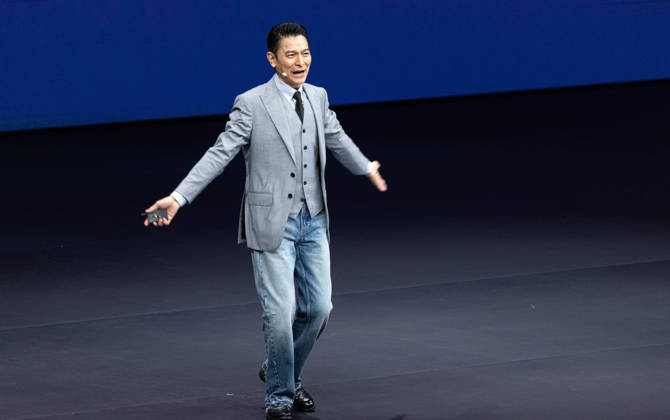 GUANGZHOU, CHINA - SEPTEMBER 07: Andy Lau, brand ambassador for Huawei s Ultimate Design series, speaks at the launch event for the Huawei tri-fold Mate XT 2 on September 7, 2026 in Guangzhou, Guangdong Province of China. Huawei released its latest tri-fold smartphone featuring a new generation chip.  Copyright: xVCGx 111664712397