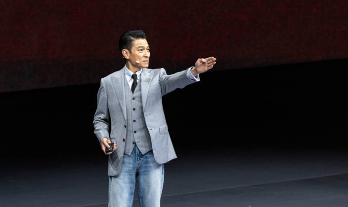 GUANGZHOU, CHINA - SEPTEMBER 07: Andy Lau, brand ambassador for Huawei s Ultimate Design series, speaks at the launch event for the tri-fold Mate XT 2 on September 7, 2026 in Guangzhou, Guangdong Province of China. Huawei unveiled its latest tri-fold smartphone featuring a new generation chip with improved performance.  Copyright: xVCGx 111664712403