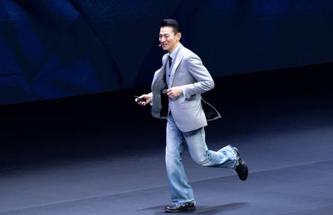 GUANGZHOU, CHINA - SEPTEMBER 07: Andy Lau, brand ambassador for Ultimate Design, speaks at the launch event for the Huawei tri-fold Mate XT 2 Ultimate Design on September 7, 2026 in Guangzhou, Guangdong Province of China. The new device features a next-generation chip with a 42 percent performance improvement.  Copyright: xVCGx 111664712410
