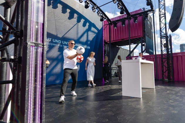 DIGITAL X 2026 at the Rheinauhafen in Cologne, September 8, 2026 Former national soccer player and 2014 World Cup champion Lukas PODOLSKI, along with Prof. Dr. Alena Buyx and Klaus Werner, visitors learn more at DIGIT Copyright: xMarcxJohnx