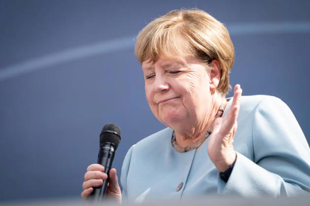 Digital X 2026: Dr. Angela Merkel, former German Chancellor, with a satisfied expression and her eyes closed on the Harbor Stage at Digital X 2026. DIGITAL X is Europe’s leadin