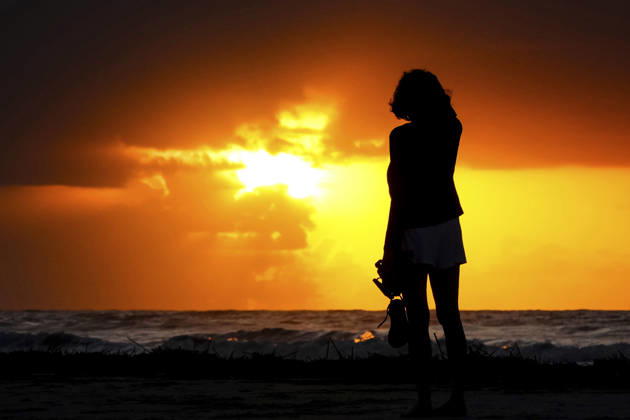 September 9, 2026, Isle Of Palms, Sc, United States: A woman standing on the Front Beach each watches the sunrise as storm clouds gather over the Atlantic Ocean, September 9, 2026 in Isle of Palms, South Carolina. Isle Of Palms United States - ZUMAe02_ 20260909_zaf_e02_002 Copyright: xRichardxEllisx