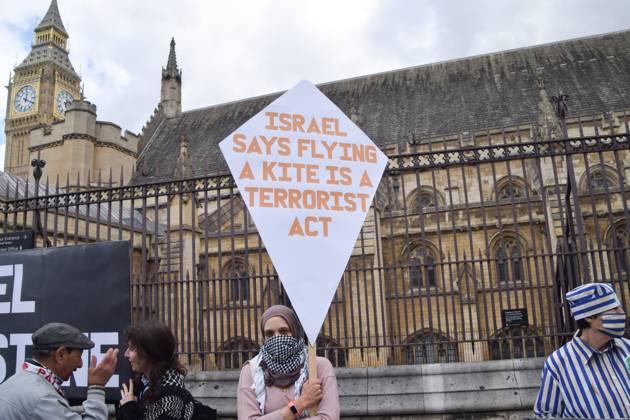 September 9, 2026, London, United Kingdom: A protester holds a placard stating Israel says flying a kite is a terrorist act during the demonstration..Protesters gathered in Parliament Square in support of Palestine and against what the protesters call a pro-Israel and Zionist influence in UK politics. London United Kingdom - ZUMAs197 20260909_aaa_s197_112 Copyright: xVukxValcicx