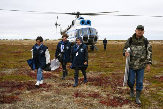 Russia Parliamentary Election Early Voting 9239426 09.09.2026 Members of the local election commission walk during the early voting in remote areas ahead of State Duma elections at a reindeer camping ground, in Yamalo-Nenets Autonomous Area, Russia. Russians will vote in State Duma, the lower house of parliament, and municipal elections over three days, from September 18-20. Alexandr Kryazhev Sputnik Yamalo-Nenets Autonomous Area Russia  Copyright: xAlexandrxKryazhevx