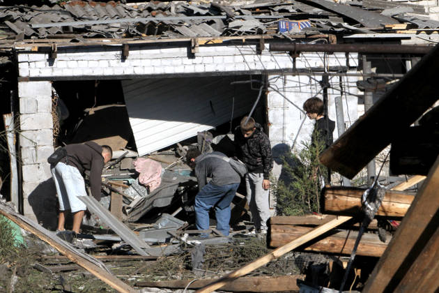 Aftermath of Russian drone attack in Dnipro Teenage boys inspect a private house destroyed in a Russian drone attack in Dnipro, Ukraine, on September 9, 2026. On Wednesday night, September 9, Russian drones struck the eastern Ukrainian city. The attack caused fires at warehouses storing building materials and at a private house. Rescuers freed three people, including a 15-year-old boy, from the basement of the damaged home. A 51-year-old man and a 52-year-old woman were taken to hospital. Dnipro Ukraine  Copyright: xMykolaxMiakshykovx originalFilename: ukrinform-aftermat260909_npdkn.jpg