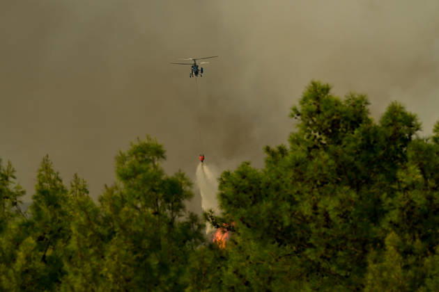 Firefighting efforts continue against wildfire in Turkiye s Antalya ANTALYA, TURKIYE - SEPTEMBER 09: A firefighting aircraft drops water over a wildfire that broke out in a forested area as firefighting efforts continue from the air and on the ground in Kizilli neighborhood of Kepez district, Antalya, Turkiye, on September 09, 2026. Orhan Cicek Anadolu Antalya Turkey. Editorial use only. Please get in touch for any other usage.  Copyright: x2026xAnadoluxOrhanxCicekx