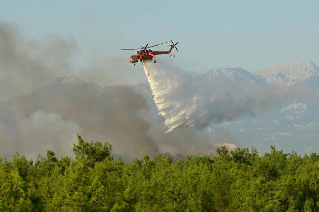 Firefighting efforts continue against wildfire in Turkiye s Antalya ANTALYA, TURKIYE - SEPTEMBER 09: A firefighting aircraft drops water over a wildfire that broke out in a forested area as firefighting efforts continue from the air and on the ground in Kizilli neighborhood of Kepez district, Antalya, Turkiye, on September 09, 2026. Orhan Cicek Anadolu Antalya Turkey. Editorial use only. Please get in touch for any other usage.  Copyright: x2026xAnadoluxOrhanxCicekx