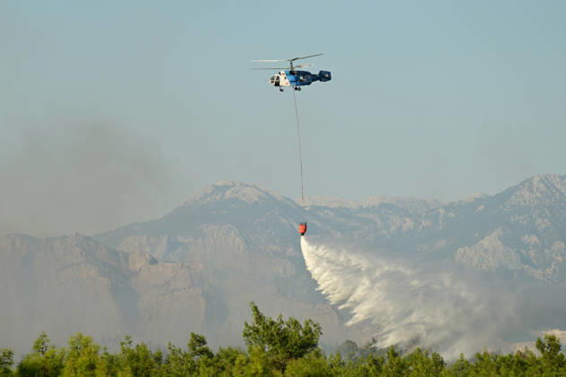 Firefighting efforts continue against wildfire in Turkiye s Antalya ANTALYA, TURKIYE - SEPTEMBER 09: A firefighting aircraft drops water over a wildfire that broke out in a forested area as firefighting efforts continue from the air and on the ground in Kizilli neighborhood of Kepez district, Antalya, Turkiye, on September 09, 2026. Orhan Cicek Anadolu Antalya Turkey. Editorial use only. Please get in touch for any other usage.  Copyright: x2026xAnadoluxOrhanxCicekx