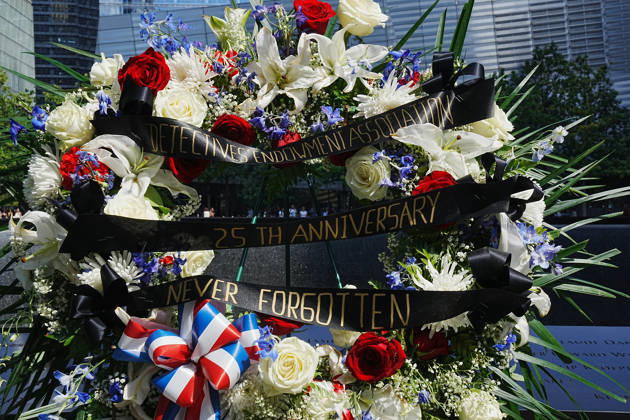 September 9, 2026, New York, New York, USA: A memorial and flower arrangement to the NYPD along the South Tower reflecting pool ahead of the 25th anniversary of the attacks of September 11 at the 9 11 Memorial on September 9, 2026 in New York. New York USA  - ZUMAb148 20260909_zap_b148_008 Copyright: xBryanxSmithx