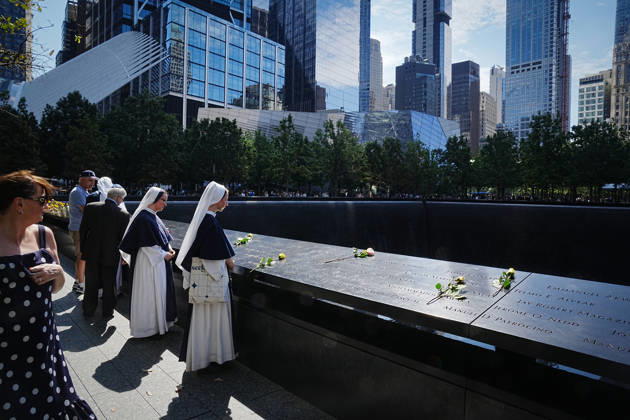 September 9, 2026, New York, New York, USA: Sisters from New York s Sisters of Life look over the North Tower reflecting pool ahead of the 25th anniversary of the attacks of September 11 at the 9 11 Memorial on September 9, 2026 in New York. New York USA - ZUMAb148 20260909_zap_b148_022 Copyright: xBryanxSmithx
