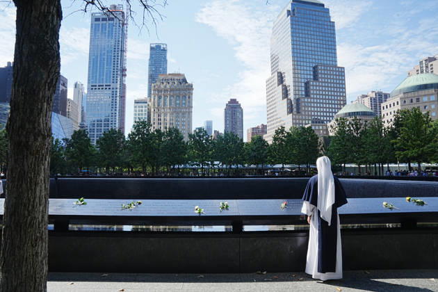 September 9, 2026, New York, New York, USA: Sister Molly from New York s Sisters of Life looks over the North Tower reflecting pool ahead of the 25th anniversary of the attacks of September 11 at the 9 11 Memorial on September 9, 2026 in New York. New York USA  - ZUMAb148 20260909_zap_b148_039 Copyright: xBryanxSmithx