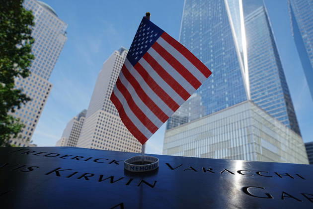 September 9, 2026, New York, New York, USA: An American flag at the North Tower reflecting pool with One World Trade Center in the background ahead of the 25th anniversary of the attacks of September 11 at the 9 11 Memorial on September 9, 2026 in New York. New York USA - ZUMAb148 20260909_zap_b148_034 Copyright: xBryanxSmithx