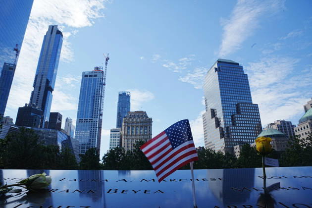 September 9, 2026, New York, New York, USA: Roses and an American flag with victims names along the North Tower reflecting pool ahead of the 25th anniversary of the attacks of September 11 at the 9 11 Memorial on September 9, 2026 in New York. New York USA  - ZUMAb148 20260909_zap_b148_064 Copyright: xBryanxSmithx