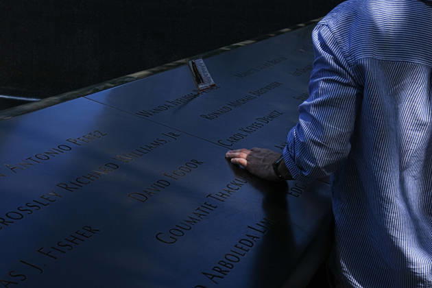 September 9, 2026, New York, New York, USA: Visitors look over the South Tower reflecting pool ahead of the 25th anniversary of the attacks of September 11 at the 9 11 Memorial on September 9, 2026 in New York. New York USA - ZUMAb148 20260909_zap_b148_038 Copyright: xBryanxSmithx