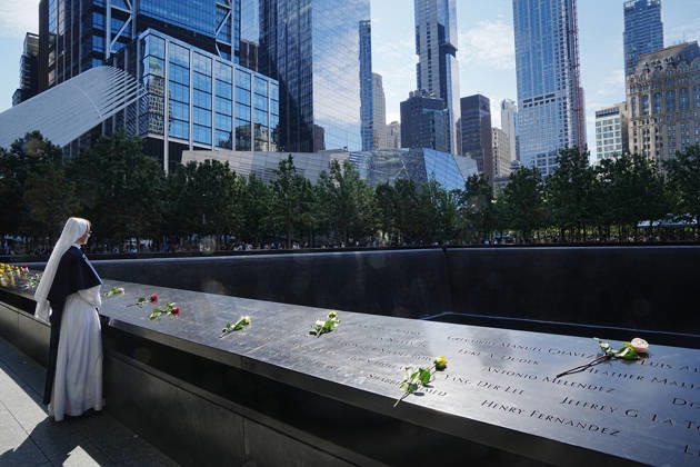 September 9, 2026, New York, New York, USA: Sister Molly from New York s Sisters of Life looks over the North Tower reflecting pool ahead of the 25th anniversary of the attacks of September 11 at the 9 11 Memorial on September 9, 2026 in New York. New York USA - ZUMAb148 20260909_zap_b148_051 Copyright: xBryanxSmithx