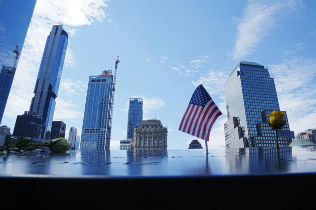 September 9, 2026, New York, New York, USA: Roses and an American flag with victims names along the North Tower reflecting pool ahead of the 25th anniversary of the attacks of September 11 at the 9 11 Memorial on September 9, 2026 in New York. New York USA - ZUMAb148 20260909_zap_b148_060 Copyright: xBryanxSmithx