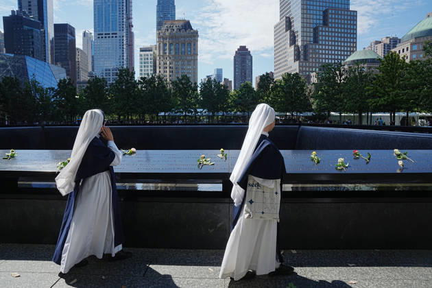 September 9, 2026, New York, New York, USA: Sisters from New York s Sisters of Life look over the North Tower reflecting pool ahead of the 25th anniversary of the attacks of September 11 at the 9 11 Memorial on September 9, 2026 in New York. New York USA - ZUMAb148 20260909_zap_b148_061 Copyright: xBryanxSmithx