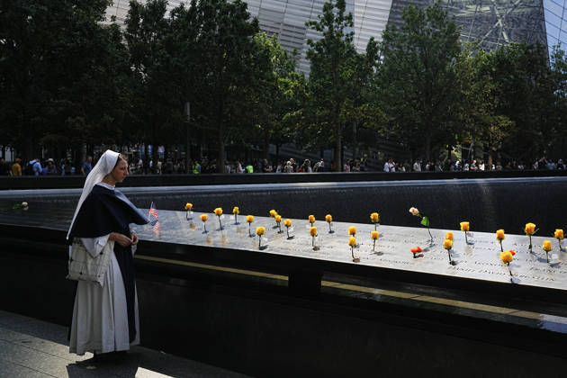 September 9, 2026, New York, New York, USA: A Sister from New York s Sisters of Life looks over the North Tower reflecting pool ahead of the 25th anniversary of the attacks of September 11 at the 9 11 Memorial on September 9, 2026 in New York. New York USA - ZUMAb148 20260909_zap_b148_063 Copyright: xBryanxSmithx