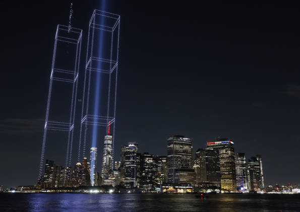 A light installation in the shape of the Twin Towers is illuminated with drones over One World Trade Center and the Manhattan skyline in the days leading up to the 25th anniversary of the 9 11 terrorist attacks on the World Trade Center in New York City on Wednesday, September 9, 2026. A public art installation designed in conjunction with representatives of the family, survivor, responder community was unveiled over New York Harbor, originating from Governor s Island. 2977 Lights Over New York Harbor is a sponsored project of New York Foundation of the Arts.  NYP20260909104 JOHNxANGELILLO