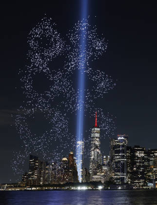 A light installation in the shape of the Twin Towers is illuminated with drones over One World Trade Center and the Manhattan skyline in the days leading up to the 25th anniversary of the 9 11 terrorist attacks on the World Trade Center in New York City on Wednesday, September 9, 2026. A public art installation designed in conjunction with representatives of the family, survivor, responder community was unveiled over New York Harbor, originating from Governor s Island. 2977 Lights Over New York Harbor is a sponsored project of New York Foundation of the Arts.  NYP20260909105 JOHNxANGELILLO