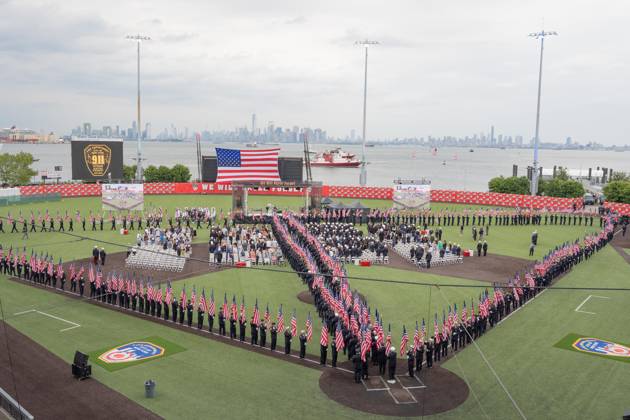 September 9, 2026, New York, New York, USA: Members of FDNY walked with 343 American flags for each member who sacrificed their live on September 11, 2001 during memorial service to commemorate 25th anniversary of terrorist attack on World Trade Center in New York. Service was held at FerryHawks Stadium of Staten Island Borough, New York, NY on September 9, 2026. FDNY members, families of those how perished on that day and who died after of illnesses related to their work in the rescue and recovery efforts, members of fire departments from around the country as well as firefighters from Italy and France attended the service. New York USA - ZUMAr339 20260909_znp_r339_004 Copyright: xLevxRadinx