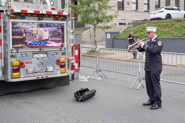 September 9, 2026, New York, New York, USA: Member of FDNY plays trumpet as members of FDNY walked with 343 American flags for each member who sacrificed their live on September 11, 2001 during memorial service to commemorate 25th anniversary of terrorist attack on World Trade Center in New York. Service was held at FerryHawks Stadium of Staten Island Borough, New York, NY on September 9, 2026. FDNY members, families of those how perished on that day and who died after of illnesses related to their work in the rescue and recovery efforts, members of fire departments from around the country as well as firefighters from Italy and France attended the service. New York USA - ZUMAr339 20260909_znp_r339_011 Copyright: xLevxRadinx