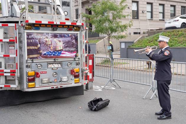 September 9, 2026, New York, New York, USA: Member of FDNY plays trumpet as members of FDNY walked with 343 American flags for each member who sacrificed their live on September 11, 2001 during memorial service to commemorate 25th anniversary of terrorist attack on World Trade Center in New York. Service was held at FerryHawks Stadium of Staten Island Borough, New York, NY on September 9, 2026. FDNY members, families of those how perished on that day and who died after of illnesses related to their work in the rescue and recovery efforts, members of fire departments from around the country as well as firefighters from Italy and France attended the service. New York USA - ZUMAr339 20260909_znp_r339_012 Copyright: xLevxRadinx