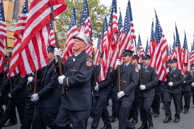 September 9, 2026, New York, New York, USA: Members of FDNY walked with 343 American flags for each member who sacrificed their live on September 11, 2001 during memorial service to commemorate 25th anniversary of terrorist attack on World Trade Center in New York. Service was held at FerryHawks Stadium of Staten Island Borough, New York, NY on September 9, 2026. FDNY members, families of those how perished on that day and who died after of illnesses related to their work in the rescue and recovery efforts, members of fire departments from around the country as well as firefighters from Italy and France attended the service. New York USA - ZUMAr339 20260909_znp_r339_017 Copyright: xLevxRadinx