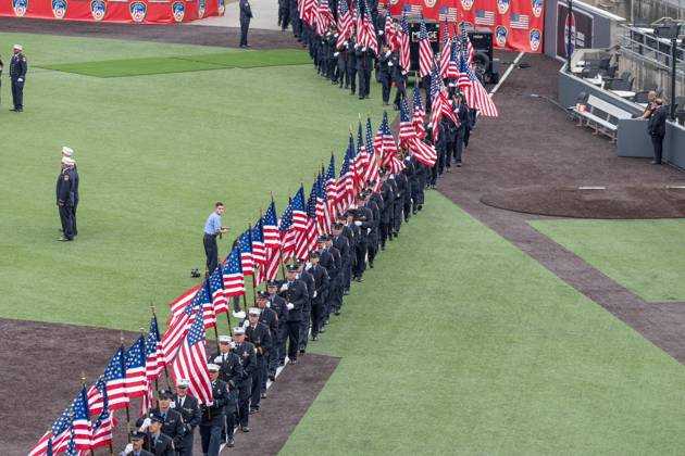 September 9, 2026, New York, New York, USA: Members of FDNY walked with 343 American flags for each member who sacrificed their live on September 11, 2001 during memorial service to commemorate 25th anniversary of terrorist attack on World Trade Center in New York. Service was held at FerryHawks Stadium of Staten Island Borough, New York, NY on September 9, 2026. FDNY members, families of those how perished on that day and who died after of illnesses related to their work in the rescue and recovery efforts, members of fire departments from around the country as well as firefighters from Italy and France attended the service. New York USA - ZUMAr339 20260909_znp_r339_024 Copyright: xLevxRadinx
