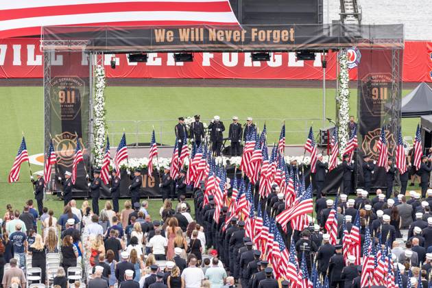 September 9, 2026, Bronx, New York, USA: Members of FDNY walked with 343 American flags for each member who sacrificed their live on September 11, 2001 during memorial service to commemorate 25th anniversary of terrorist attack on World Trade Center in New York. Service was held at FerryHawks Stadium of Staten Island Borough, New York, NY on September 9, 2026. FDNY members, families of those how perished on that day and who died after of illnesses related to their work in the rescue and recovery efforts, members of fire departments from around the country as well as firefighters from Italy and France attended the service. Bronx USA - ZUMAr339 20260909_znp_r339_025 Copyright: xLevxRadinx
