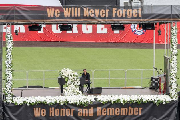 September 9, 2026, New York, New York, USA: John Ondrasik aka Five for Fighting performs song Superman (It s not Easy) during memorial service to commemorate 25th anniversary of terrorist attack on World Trade Center in New York. Service was held at FerryHawks Stadium of Staten Island Borough, New York, NY on September 9, 2026. FDNY members, families of those how perished on that day and who died after of illnesses related to their work in the rescue and recovery efforts, members of fire departments from around the country as well as firefighters from Italy and France attended the service. New York USA - ZUMAr339 20260909_znp_r339_035 Copyright: xLevxRadinx