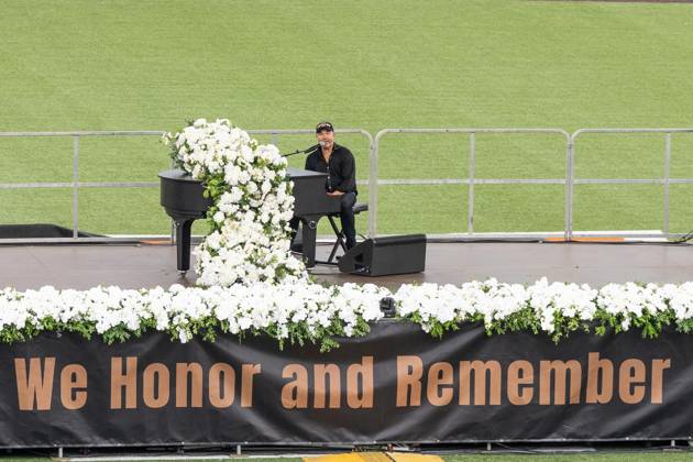 September 9, 2026, New York, New York, USA: John Ondrasik aka Five for Fighting performs song Superman (It s not Easy) during memorial service to commemorate 25th anniversary of terrorist attack on World Trade Center in New York. Service was held at FerryHawks Stadium of Staten Island Borough, New York, NY on September 9, 2026. FDNY members, families of those how perished on that day and who died after of illnesses related to their work in the rescue and recovery efforts, members of fire departments from around the country as well as firefighters from Italy and France attended the service. New York USA - ZUMAr339 20260909_znp_r339_036 Copyright: xLevxRadinx