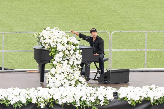 September 9, 2026, New York, New York, USA: John Ondrasik aka Five for Fighting performs song Superman (It s not Easy) during memorial service to commemorate 25th anniversary of terrorist attack on World Trade Center in New York. Service was held at FerryHawks Stadium of Staten Island Borough, New York, NY on September 9, 2026. FDNY members, families of those how perished on that day and who died after of illnesses related to their work in the rescue and recovery efforts, members of fire departments from around the country as well as firefighters from Italy and France attended the service. New York USA - ZUMAr339 20260909_znp_r339_037 Copyright: xLevxRadinx