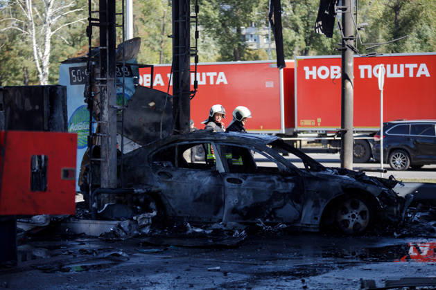 Firefighters work at a petrol station attacked by a Russian drone in the Holosiivskyi district of Kyiv, Ukraine, September 10, 2026. Russian forces targeted the petrol station, injuring four people. A car caught fire on the premises, and a public transport stop was also damaged. (Photo by Marianna Kotyk Ukrinform) Russian drone strikes petrol station in Kyiv’s Holosiivskyi district  Copyright: xMariannaxKotykx