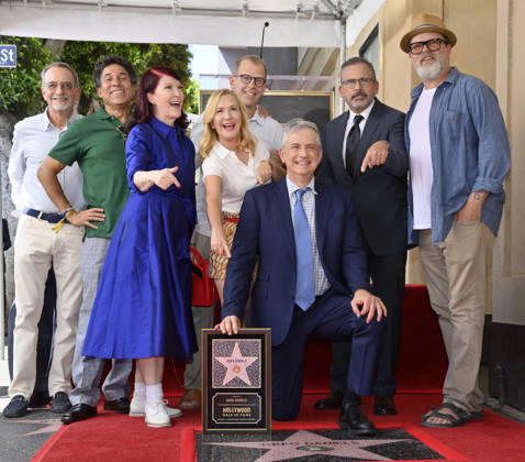 American screenwriter, television producer and director Greg Daniels kneels as he is joined by actors Oscar Nunez, Kate Flannery, Paul Lieberstein, Angela Kinsey, Steve Carell, and Rainn Wilson (L-R) during an unveiling ceremony honoring Daniels with the 2,856th star on the Hollywood Walk of Fame in Los Angeles on Thursday, September 10, 2026.  LAP2026091007 JIMxRUYMEN