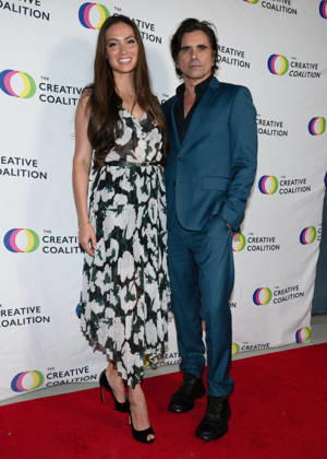 September 10, 2026, Toluca Lake, California, USA: American actress, writer, and model. CAITLIN MCHUGH, 40, and American actor and musician JOHN STAMOS, 63, attends The Creative Coalition Hosts 12th Annual Humanitarian Awards Dinner red carpet. Toluca Lake USA  - ZUMAb173 20260910_aap_b173_012 Copyright: xBillyxBennightx