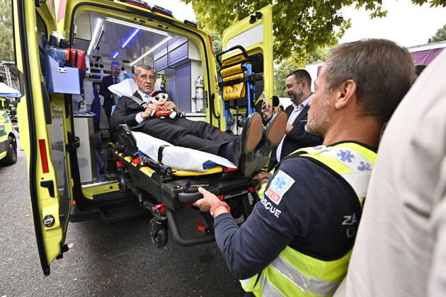 Czech Prime Minister Andrej Babis (ANO) tries out the stretcher in a new ambulance during the handover of ambulances to the Usti nad Labem Region Emergency Medical Service on September 11, in Litomerice, Czech Republic. (CTKxPhoto OndrejxHajek) CTKPhotoP2026091105862  CTKPhotoP2026091105862
